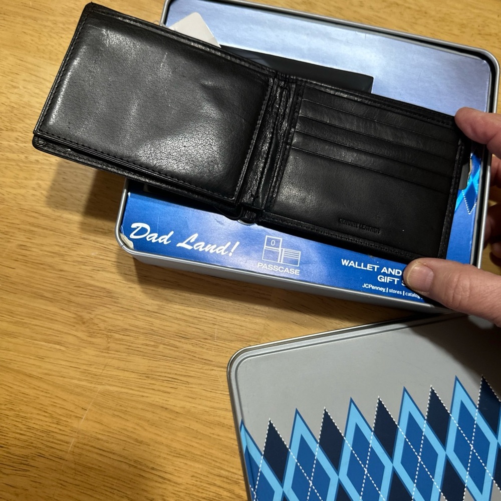 Black Leather Wallet by [Brand]
